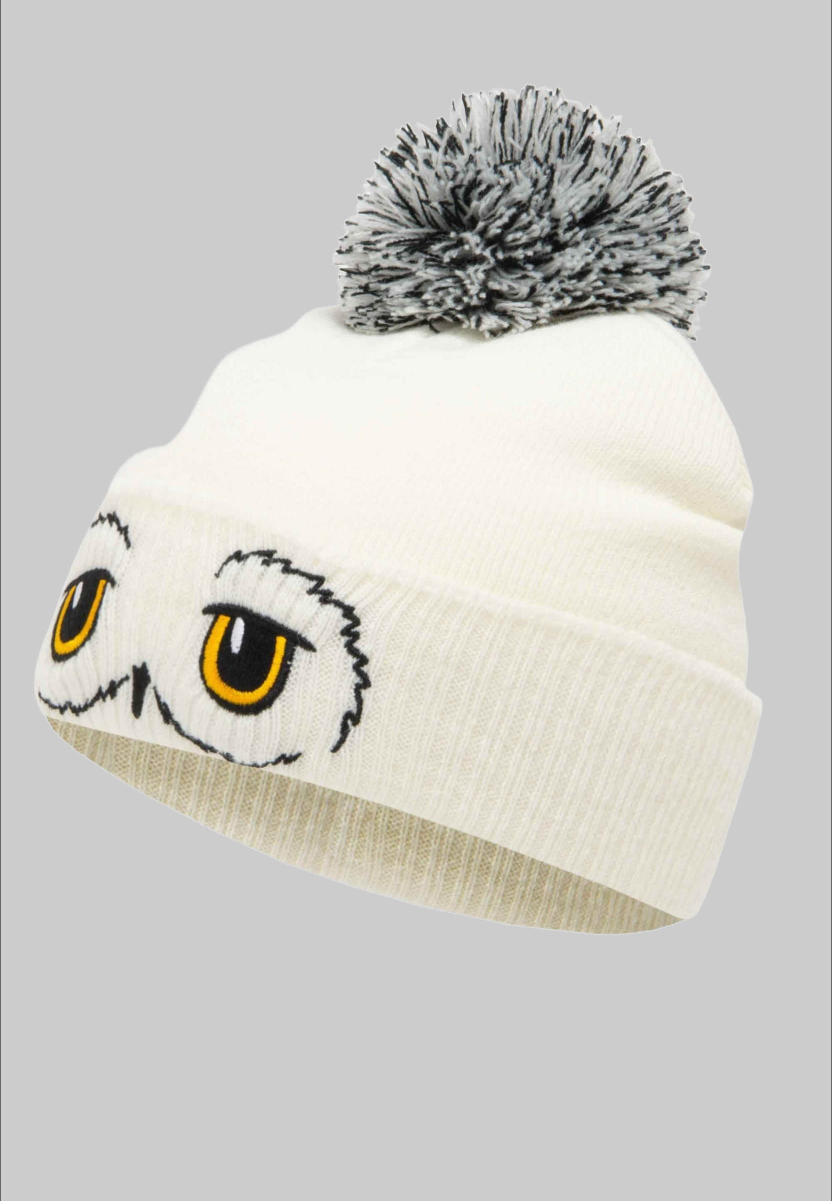 Mädchenmode LOGOSHIRT LOGOSHIRT Strickmütze Harry Potter - Hedwig mit lizenzierten Stickerei